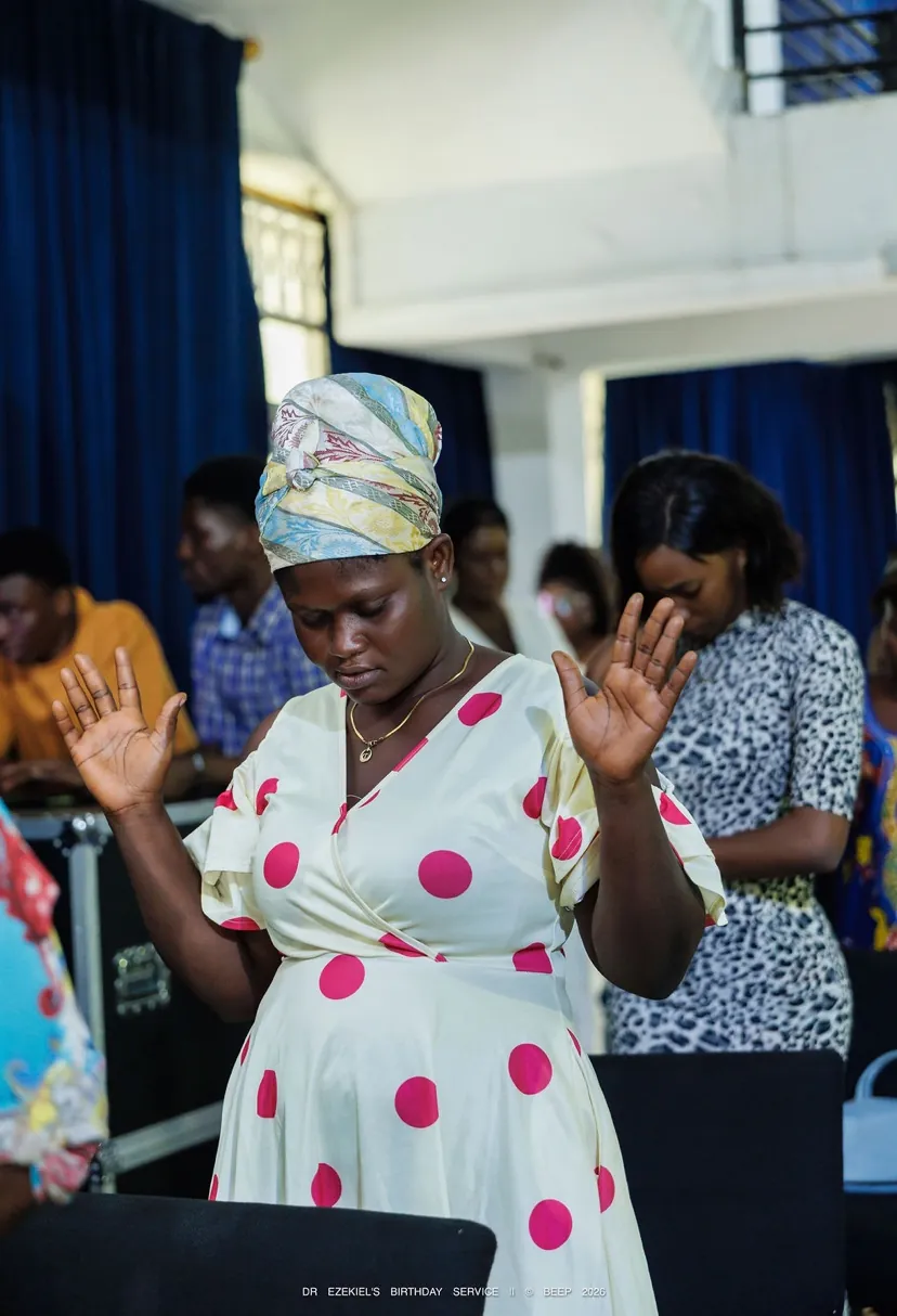 Hands raised in prayer